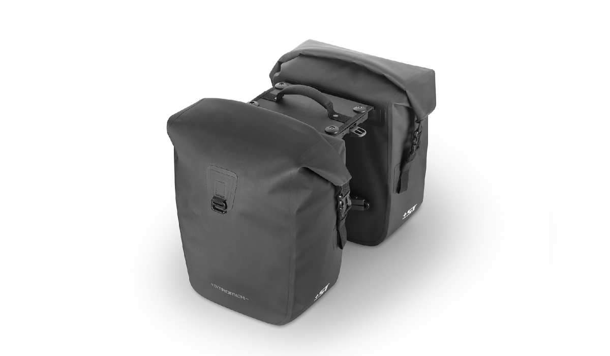 Stromer Barcelon Double Bag e-bike carrier bag in black, with 2 x 20 liter capacity, removable shoulder strap, reflective logo on two sides.